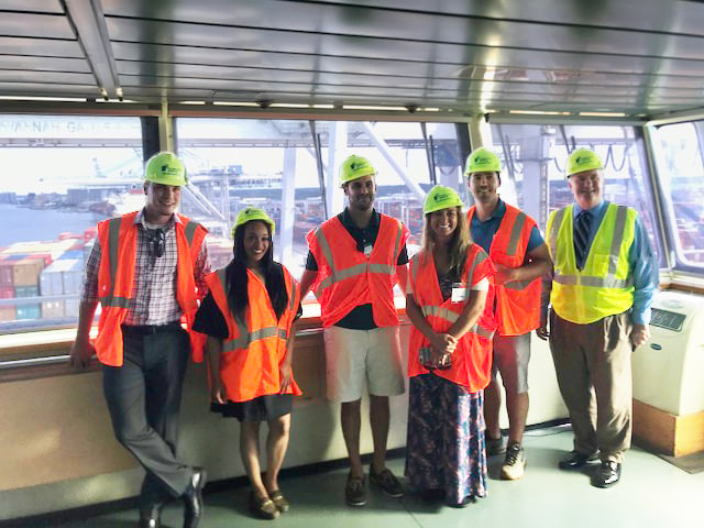 UWL Supply Chain Award winners stand with their tour guides aboard the MSC Lucy. From left to right: Celestino "Tino" Nieves, Latesha Mosley, Dave Pycraft (UWL Savannah Tour Guide), Adrienne Parrish, Johnny Maiden, Bill Barrs (Regional Sales Manager, Georgia Ports Authority)