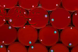 red steel chemical tanks or oil tanks stacked in a row. background and texture