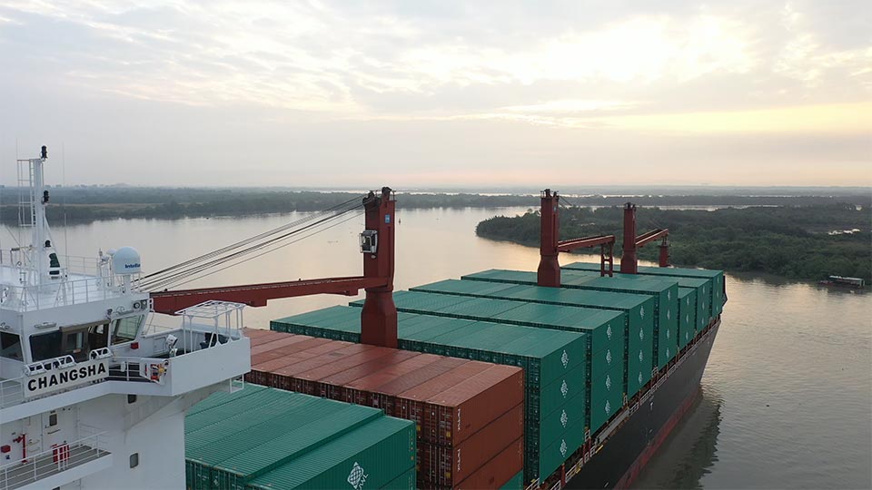 Swire Shipping vessel Changsha, laden with UWL containers, departs Ho Chi Minh's SP-ITC terminal during sunset.